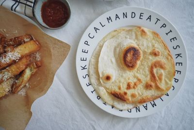 High angle view of bread in plate on table