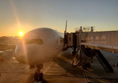 Close-up of airplane on airport runway