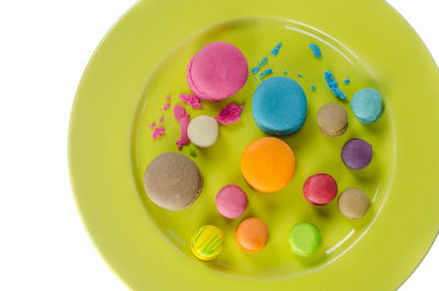 High angle view of multi colored candies in bowl