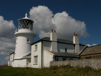 View of building against cloudy sky