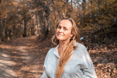 Portrait of woman in forest