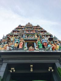 Low angle view of sri mariamman temple against the sky