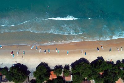 High angle view of people by sea