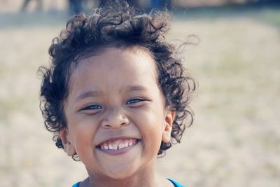 Close-up portrait of cute smiling boy