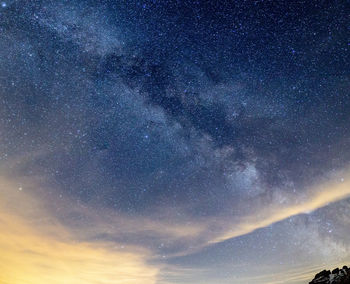 Low angle view of star field against sky at night
