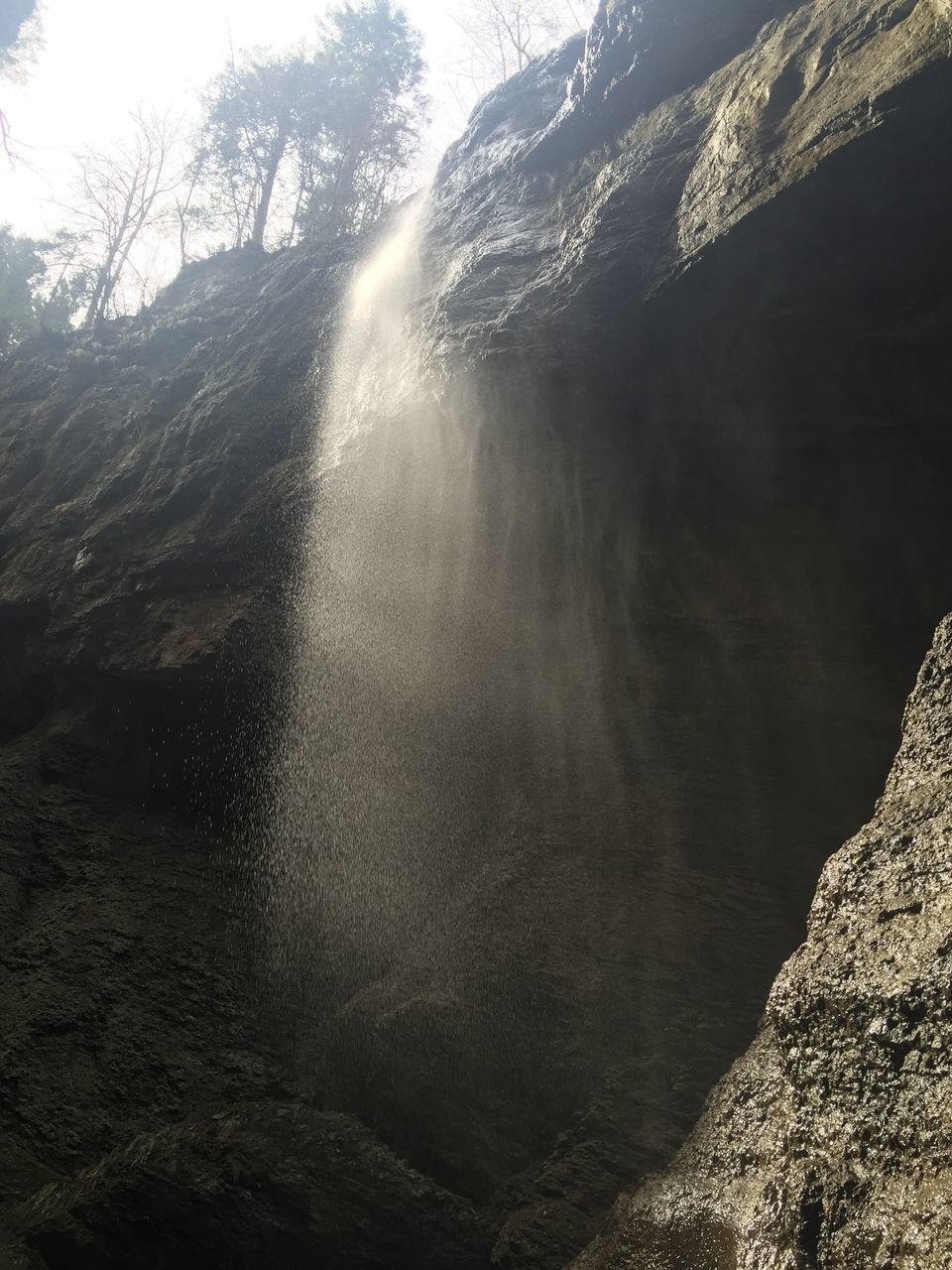 WATER FLOWING THROUGH ROCKS