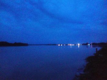 Scenic view of sea against sky at night