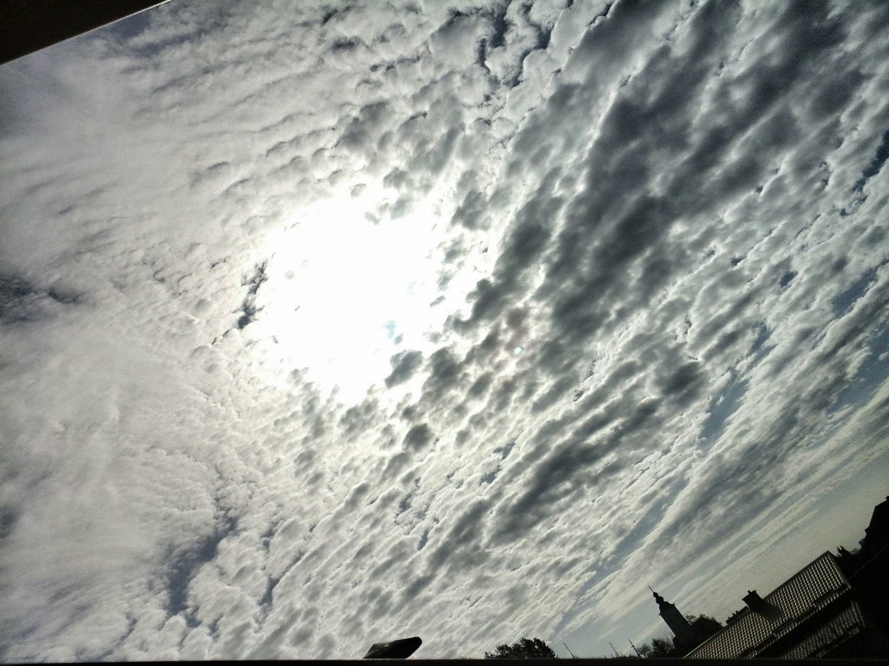 sky, low angle view, cloud - sky, built structure, architecture, building exterior, nature, cloudy, cloud, roof, scenics, outdoors, beauty in nature, no people, tilt, tranquility, silhouette, day, tranquil scene, house