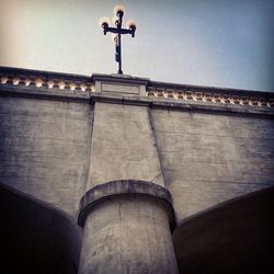 Low angle view of street light against sky