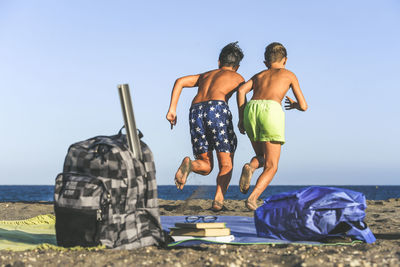 Brothers enjoying at beach