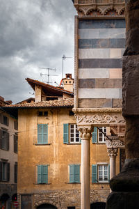 Low angle view of buildings in city
the architectural element of the old building in bergamo.