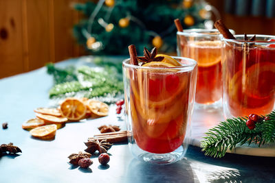 Christmas mulled wine with aromatic spices and citrus fruits. traditional christmas warming drink.