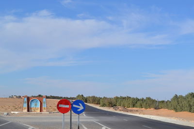 Road against cloudy sky