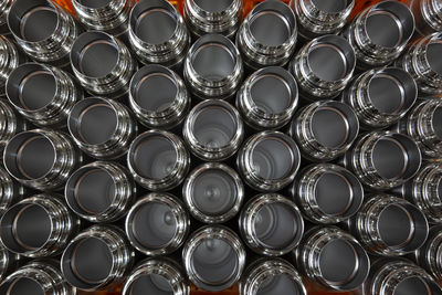 Full frame shot of metal bottles