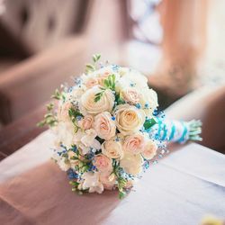 Close-up of pink rose bouquet on table