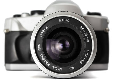 Close-up of camera on white background