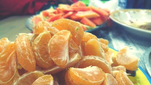 Close-up of served fruits in plate