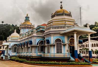 View of building against cloudy sky