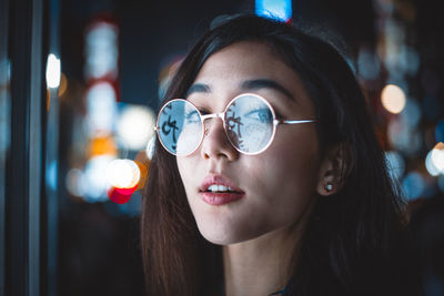 Close-up portrait of young woman