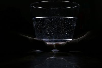 Close-up of hands in water