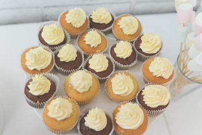 High angle view of cupcakes on table