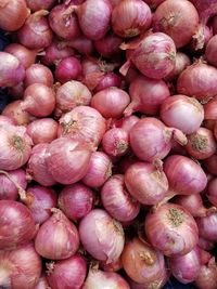 Full frame shot of onions for sale at market stall