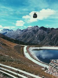 Scenic view of mountain road against sky