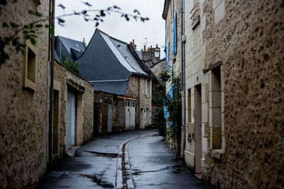 Narrow alley along buildings