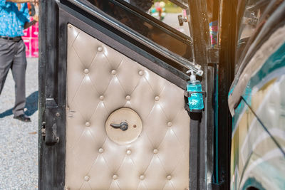 Close-up of man on glass door