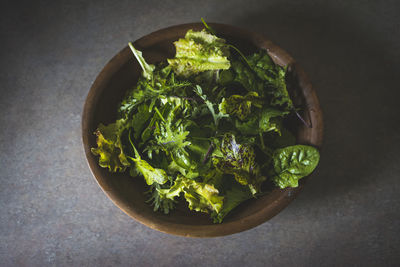 High angle view of chopped vegetables in bowl on table