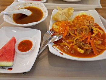 High angle view of food served on table