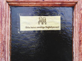 Close-up of text on wall