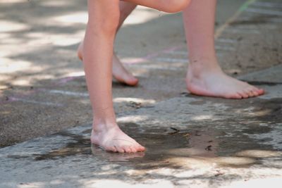 Low section of child on beach