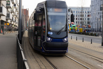 High angle view of train on street in city