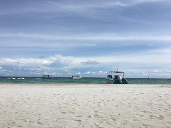 Scenic view of beach against sky