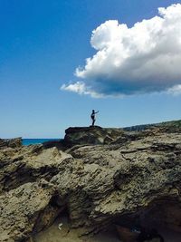 Scenic view of sea against cloudy sky