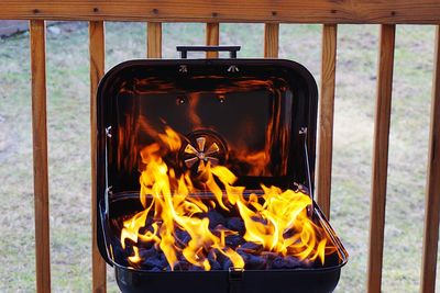 Charcoals burning barbecue grill outdoors