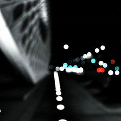 Defocused image of illuminated lights at night