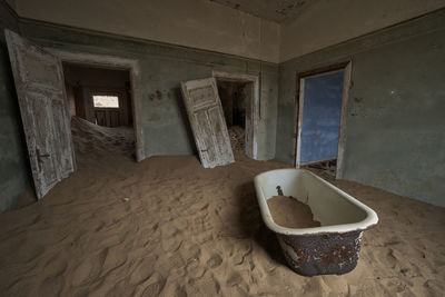 Cropped image of person in bathtub