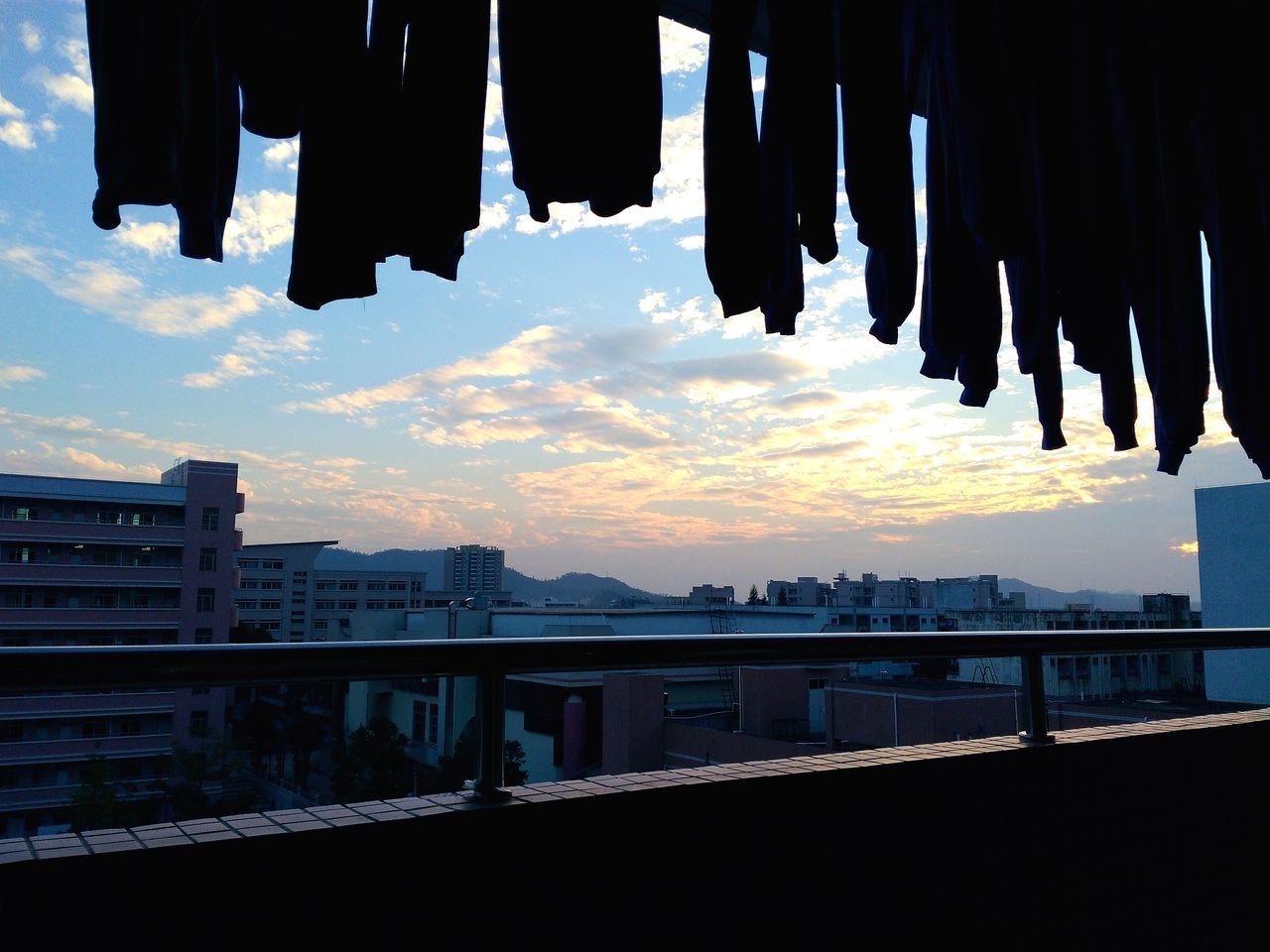 reflection, sunset, dusk, hanging, sky, outdoors, river, water, silhouette, no people, architecture, city, bridge - man made structure, day