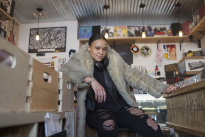 Young woman in a record store.