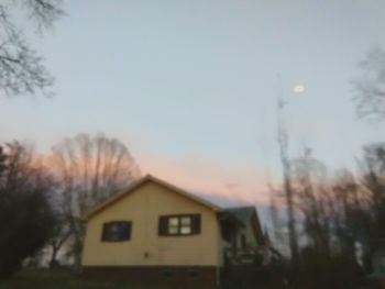 House against sky during sunset