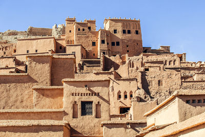 Down view of famous ait benhaddou kasbah and berber houses made of earth bricks, morocco