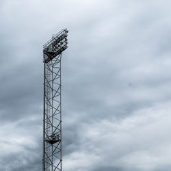 Low angle view of crane against sky