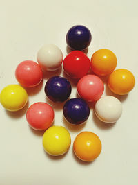 High angle view of multi colored balls on table