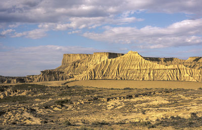 Scenic view of desert against sky