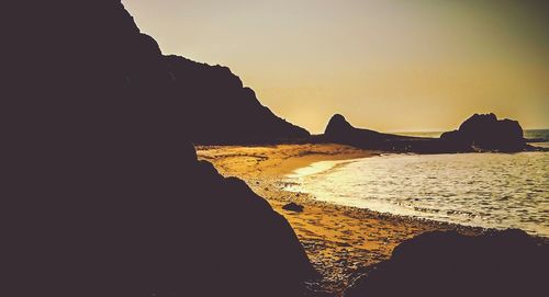 Scenic view of sea at sunset