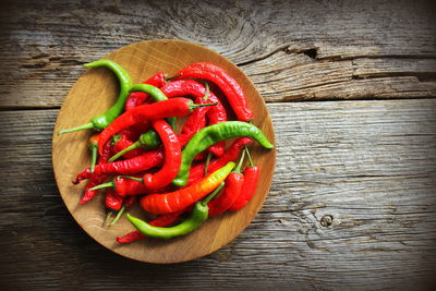 High angle view of red chili peppers on table