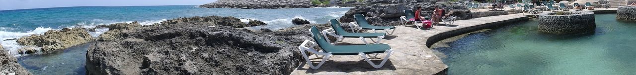 Panoramic view of buildings by sea