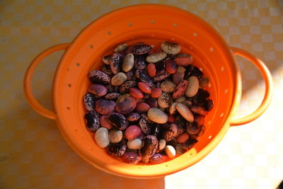 High angle view of pebbles in bowl on table